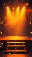 Bright stage with orange lighting and steps ready for a performance in a lively venue at night photo