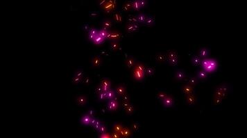 Bright embers of gold and violet sparks swirl and dart in space, like fireflies in the night. video