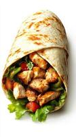 Grilled chicken wrap with fresh vegetables served in a soft tortilla photo