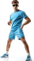 Young man in sporty attire poses confidently in bright blue clothing against a white background photo