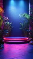 Brightly lit stage with vibrant plants and neon colors at a nighttime event in a urban setting photo
