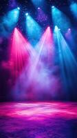 Colorful stage lighting creates a vibrant atmosphere for a performance in a theater photo