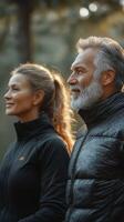 Couple enjoying a peaceful walk in the woods during early morning light, embracing nature and tranquility photo