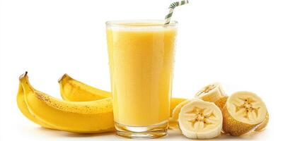 Refreshing banana smoothie served in a tall glass alongside fresh bananas on a bright background photo