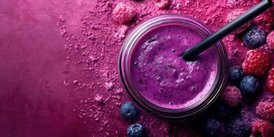 Bright and refreshing purple smoothie with berries and powder on a vibrant background photo