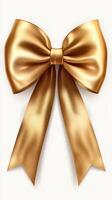 Elegant golden bow with flowing ribbons perfect for festive decorations and gift wrapping photo