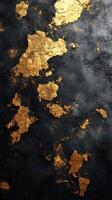 Gold leaf patterns create a stunning visual contrast against a dark textured background in an artistic composition photo