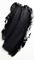 Glossy black paint texture spread across a canvas creating an artistic effect and showcasing creativity in abstract art photo