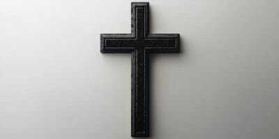 Black cross on a plain background, symbolizing faith, spirituality, and devotion in religious contexts photo