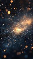 Glimmering particles creating a magical atmosphere in a dark setting during the evening hours photo