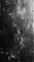 Textured black surface with scratches and marks showcasing wear and age in a minimalistic style photo