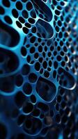 Intricate blue metallic texture showcasing complex patterns of holes and curves in a close-up view photo