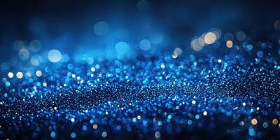 Captivating blue glitter sparkles create a mesmerizing atmosphere during a night celebration or artistic event photo