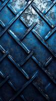 Textured blue metal surface with a distressed pattern observed in urban surroundings during daylight hours photo