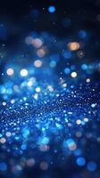 Shimmering blue glitter in a close-up display during a glamorous evening event with sparkling lights photo