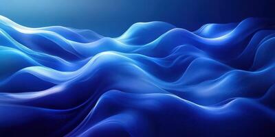 Waves undulate in deep blue tones under soft light creating a serene aquatic atmosphere photo