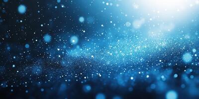 Enchanting blue glittering particles dance in a cosmic space during a serene moment photo