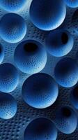 Abstract blue spheres against a dark background creating an intriguing visual texture in a digital design photo