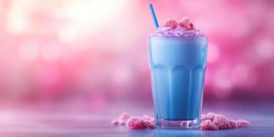 Refreshing blue raspberry milkshake served with whipped cream and candy in a vibrant background photo