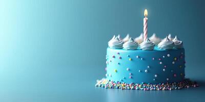 Colorful blue birthday cake with a candle and sprinkles decorated for a celebration photo
