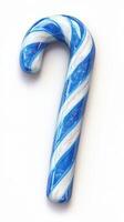 Blue and white peppermint candy cane displayed on a plain background, suitable for festive decorations and celebrations photo