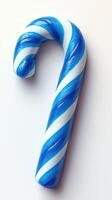 Colorful blue and white candy cane on a clean background with a glossy finish photo