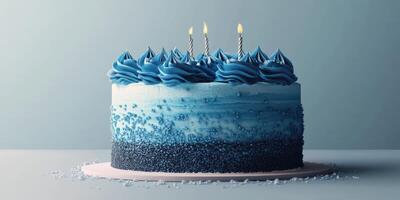 Celebrate a special occasion with a stunning blue ombre cake decorated with three lit candles on a minimalist table photo
