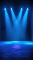Spotlights shine down on an empty stage creating a vibrant atmosphere for an upcoming performance photo
