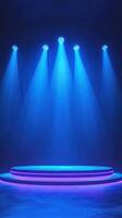 Dramatic blue stage lighting creates an atmospheric setting for performances and events in a dimly lit venue photo
