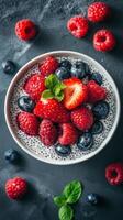 Fresh berry parfait served in a bowl, showcasing vibrant fruits and creamy texture, ideal for a healthy breakfast photo