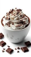 Rich hot chocolate topped with whipped cream and chocolate shavings in a cozy setting during winter photo