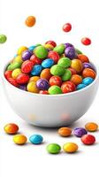Colorful candy bowl filled with vibrant chocolate-coated treats at a party setting photo