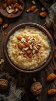 Nutritious almond porridge served in a wooden bowl garnished with nuts on a rustic wooden table in a cozy kitchen setting photo