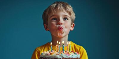 Child celebrates birthday with cake and candles in a cheerful atmosphere surrounded by colorful decorations photo