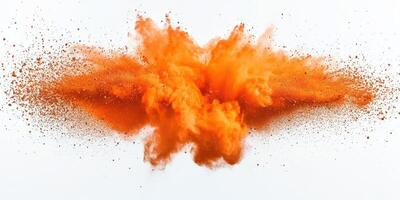 Vibrant orange powder explosion creating a dramatic cloud against a white backdrop photo