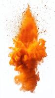Vibrant orange powder explosion creates dynamic cloud against white background photo