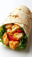 Delicious chicken wrap filled with fresh vegetables and spicy sauce ready for a healthy meal photo