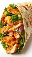 Delicious wrap filled with crispy chicken, fresh lettuce, and savory cheese on a clean background photo