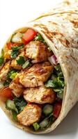 Delicious grilled chicken wrap with fresh vegetables and herbs, perfect for a light meal or snack photo