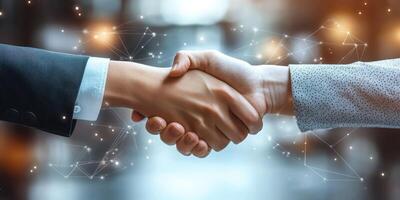 Business partnership and collaboration handshake in modern office setting during daylight hours photo