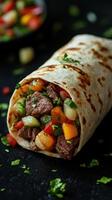 Delicious beef burrito filled with colorful vegetables wrapped in soft tortilla served on a dark backdrop photo