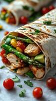 Delicious chicken wrap filled with fresh vegetables and vibrant cherry tomatoes served on a rustic table photo