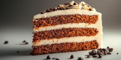 Rich chocolate cake slice with cream topping placed on a minimalist surface in soft lighting photo