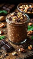 Decadent chocolate walnut smoothie topped with dark chocolate pieces and nuts on rustic wooden table photo