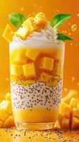 Refreshing mango dessert with cream and chia seeds served on a bright orange background photo
