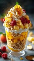 Delicious fruit parfait with layers of granola, cream, and fresh berries in a dessert glass photo