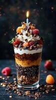 Colorful dessert with fruit, cream, and candle for celebration at a cozy indoor setting photo
