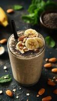 Delicious banana smoothie with nuts and seeds creates a nutritious snack or breakfast option photo