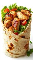 Grilled chicken wrap with fresh lettuce and tomatoes perfect for a quick meal photo