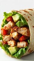 Delicious grilled chicken wrap with fresh vegetables and savory seasoning prepared in a clean kitchen photo